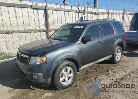 2009 Mazda Tribute Hybrid z USA, uszkodzony, nr VIN 4F2CZ49319KM07138